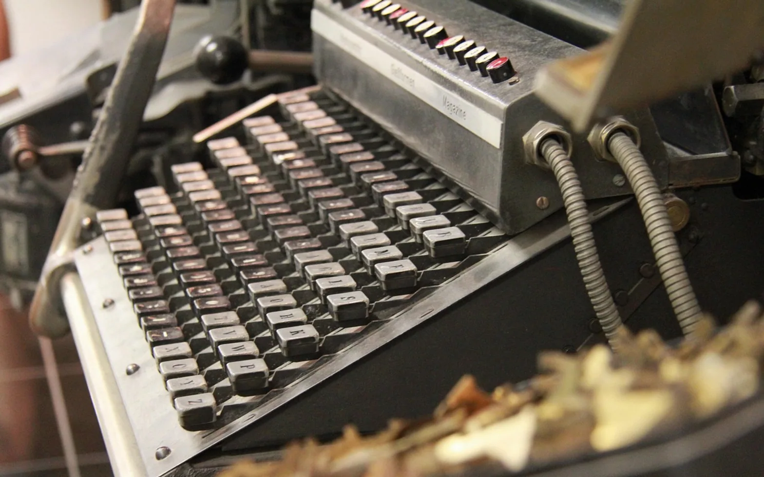 Typewriter, press and newspaper